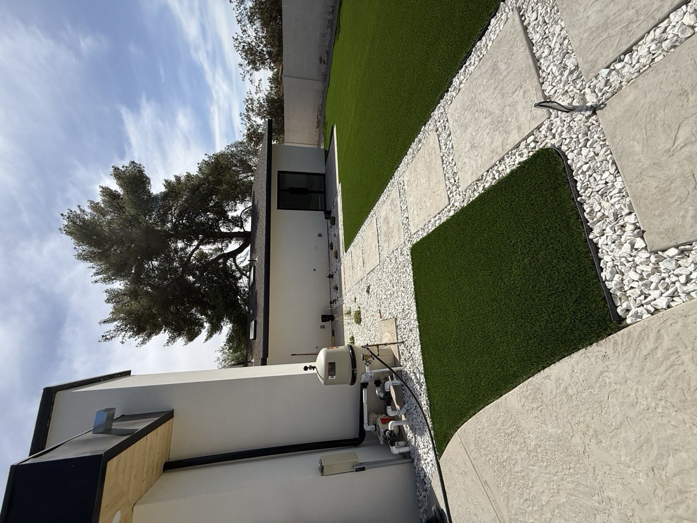Stamped concrete steppers with turf